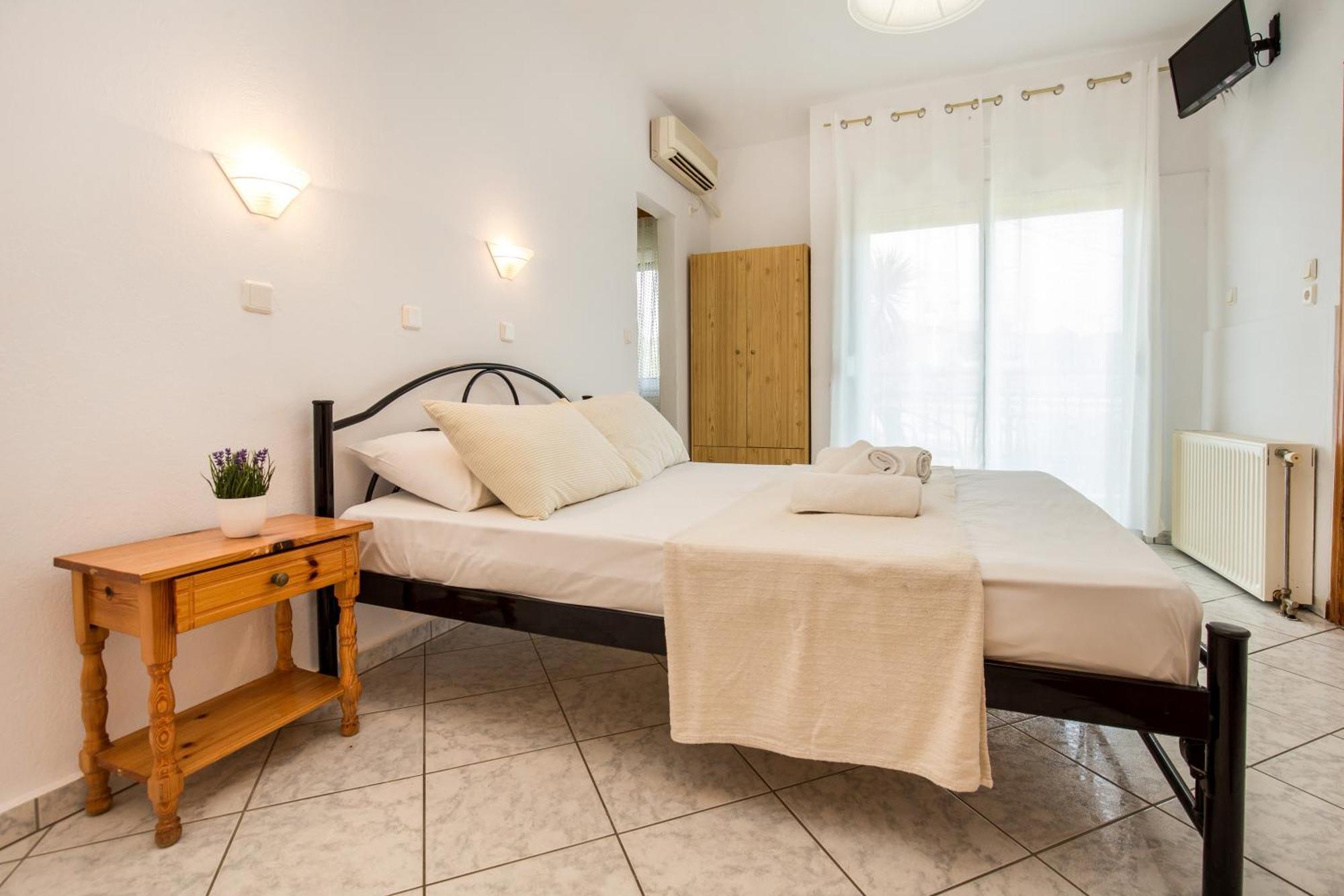 Ianos Apartments Потос Экстерьер фото